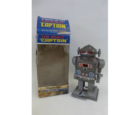 A boxed Robot 'Captain', a mechanical wind-up toy with ultra-spark, made in Japan by Yoneya Toys.