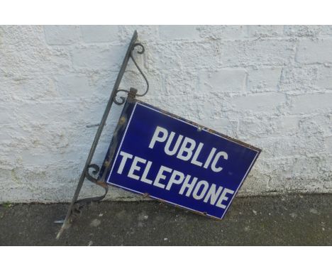 A Public Telephone double sided rectangular enamel sign on a metal bracket, 19 x 12" (sign measurement only).
