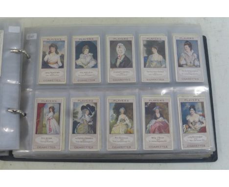 An album of cigarette cards, mainly in sets including Players 'Celebrated Gateways' and 'Army Life'.