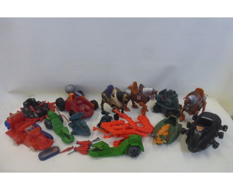 A box of Mattel and other plastic science fiction related toys.