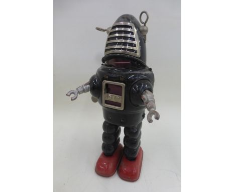 A Japanese clockwork tinplate Robbie the Robot Planet Robot. 