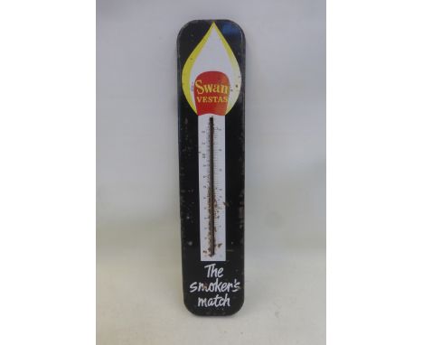 A Swan Vestas tin thermometer, 3 1/4 x 15".