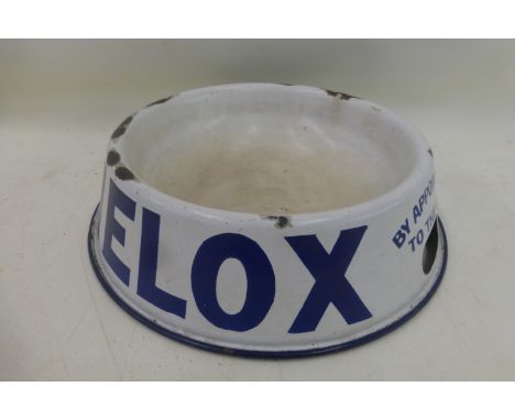 A Melox enamel dog bowl. 