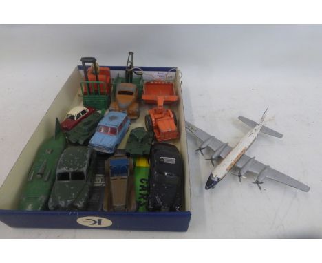 A small selection of playworn die-cast models, including Dinky and Corgi; also a model of the Bristol-Britannia aeroplane.
