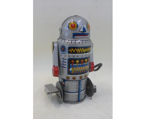 A Japanese clockwork tinplate robot.