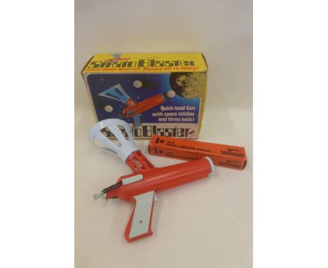 A boxed Strato Blaster, made in Great Britain by Mettoy Playcraft, complete with six table tennis balls from Slazenger as amm