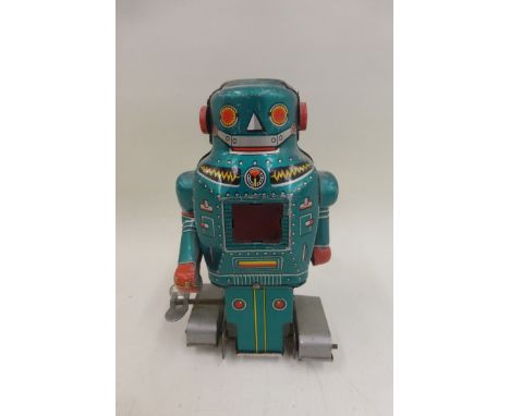 A Japanese tinplate clockwork Sparky Robot by Noguchi. 