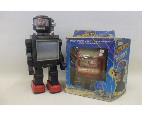A boxed Chinese battery operated Action TV Robot and one other. 