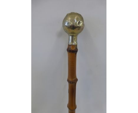 A Wellington College OTS cane swagger stick approximately 27" overall length.