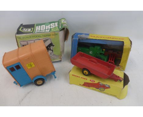 A boxed Matchbox King Size Combine Harvester, a boxed Britains Ltd. 1:32 scale Horse Box and a Dinky Halesowen Farm Trailer, 