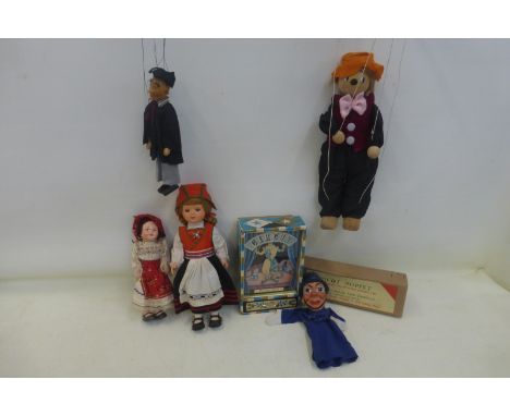 A boxed Picot Puppet, with original clothing, 'School Teacher', a late 1950s Pelham policeman puppet from the Punch and Judy 