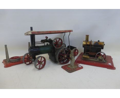 A Mamod stationary steam engine and a Mamod steam tractor.