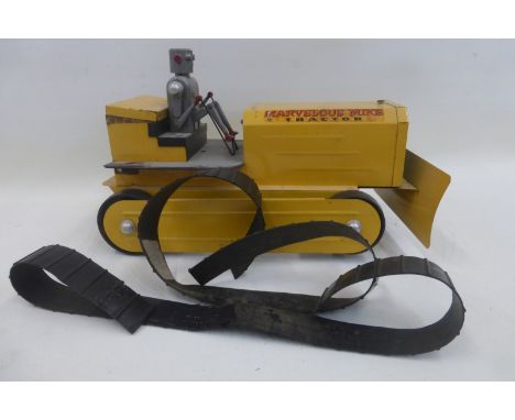 A tinplate 'Marvellous Mike Tractor' by Saunders of Aurora, Illinois.