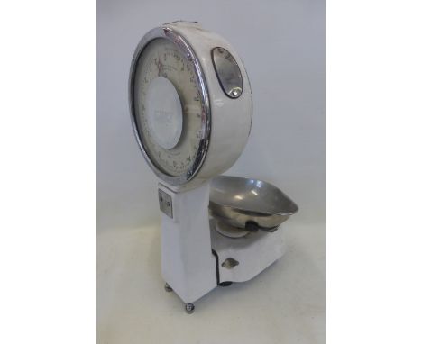 A large set of Avery white enamel butcher's scales of unusual circular form.