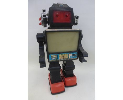 A plastic TV robot, made in Hong Kong.