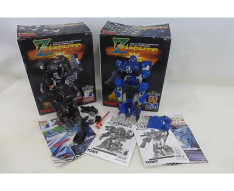 A boxed battery driven battle robot by Tomy.