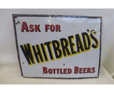 A Whitbread's Bottled Beers rectangular enamel sign by Stainton, 27 x 21".
