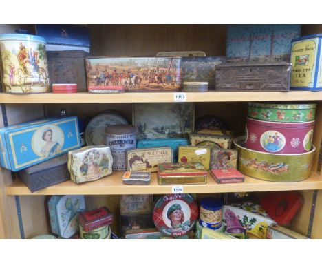 A shelf full of assorted tins.