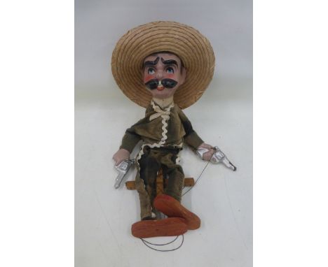A Mexican string puppet, circa 1950s, in good condition.