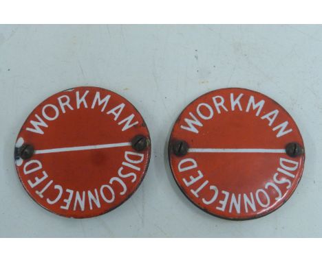Two red and white enamel discs for 'Workmen'.