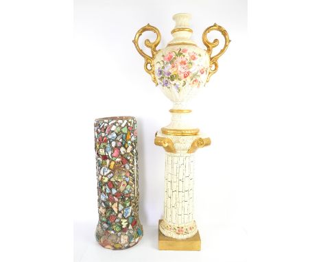 Stoneware pipe decorated with broken china and mirror glass and a decorative twin handled urn with pedestal