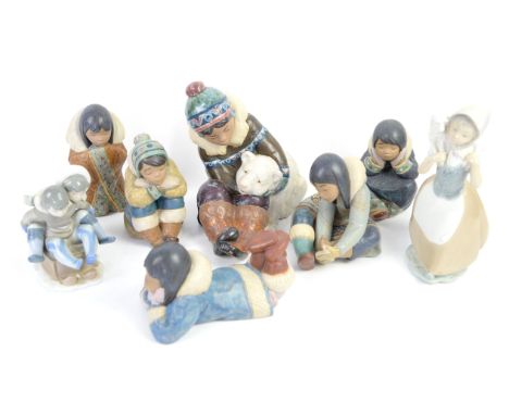 Group of six Lladro eskimo figures, and another Lladro and NAO figure, (8), 