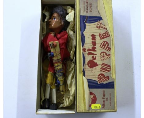 A Pelham puppet in original box 