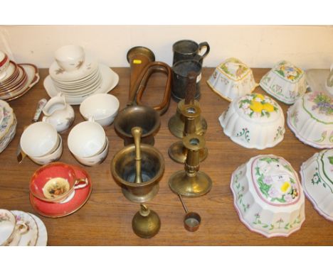 Two 19th Century pewter tankards; a brass bell; two brass mortars; a pair of Victorian candlesticks; a bugle etc. 