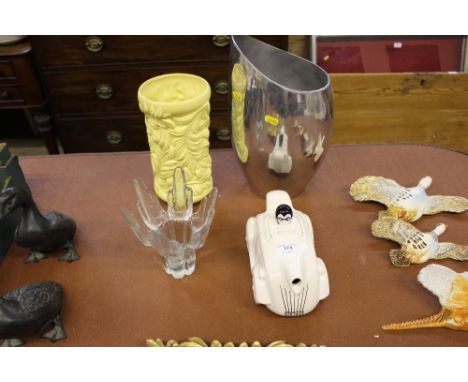 A gilt decorated wall clock; Sylvac vase; a novelty teapot in the form of a race car etc.