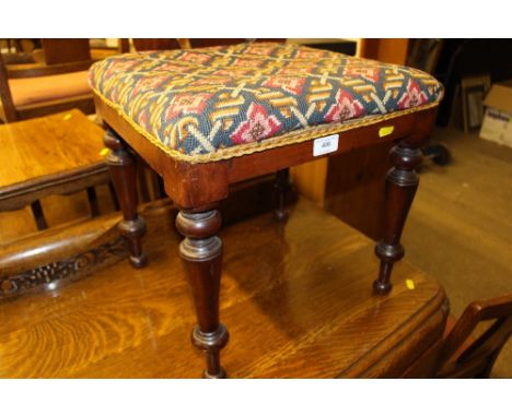 A mahogany framed and tapestry seated stool