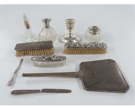 Hallmarked silver mounted items including hand mirror, two books, three dressing table pots or bottles, dwarf candlestick and