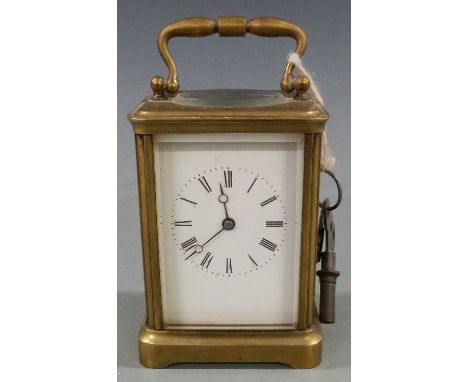 Late 19thC brass carriage clock in corniche style case, with white Roman dial and Breguet style hands, 12cm tall