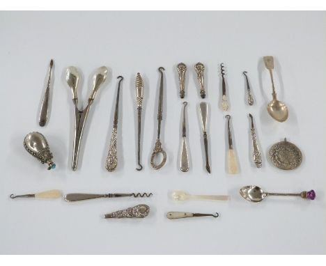 Hallmarked silver handled button hooks, glove stretchers etc, hallmarked silver teaspoon, Eastern style scent bottle etc