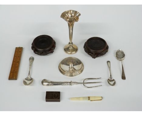 Hallmarked silver pin tray, hallmarked silver teapot, vase, hallmarked silver spoon and a spoon marked sterling, weight of sp