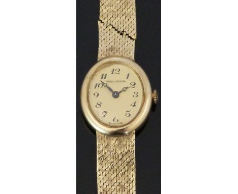 Jaeger-LeCoultre 9ct gold ladies wristwatch with black Arabic numerals, black Breguet hands, gold dial and signed movement, o