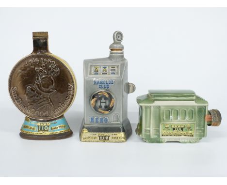 Two Beam 110 month old whiskey novelties, both 4/5 quart, one a San Francisco street car, the other San Diego and an empty Ha