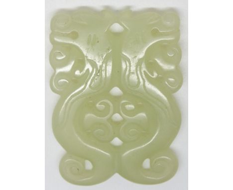 A 19thC pierced and carved jade panel with scrolling decoration, 6 x 4.4cm