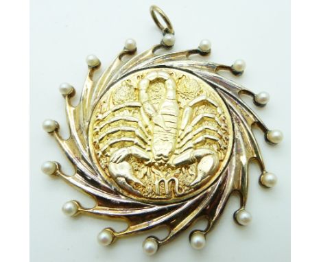Stuart Devlin silver gilt pendant depicting the Scorpio zodiac sign set with pearls with a copy of the original receipt, in o