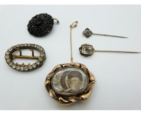 Victorian mourning brooch set with plaited hair, paste buckle, jet brooch and two stick pins