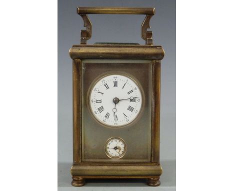 Victorian carriage alarm clock in brass case, with white enamel inset Roman dial for time and Arabic dial under for alarm, ra