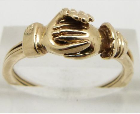 A 9ct gold Fede Gimmel ring, the hands opening to reveal a heart set with a diamond, size R, 3.87g