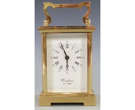 Twentieth century brass carriage clock by Woodford, the white Roman dial with Arabic minutes and Breguet style hands, 11.5cm 