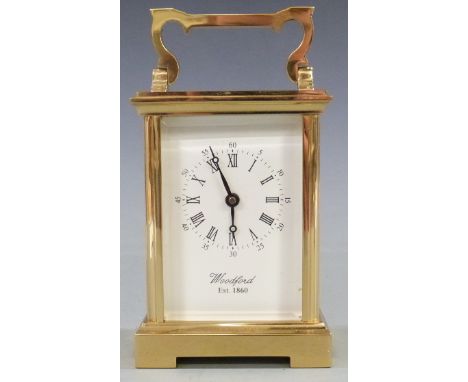 Twentieth century brass carriage clock by Woodford, the white Roman dial with Arabic minutes and Breguet style hands, 11.5cm 