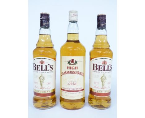 Three bottles of blended scotch whisky comprising two bottles of Bell's 40% vol, 70cl and a bottle of High Commissioner 1ltr,