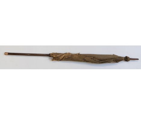 A late 19thC 20thC parasol with plated finial to handle/stick, probably zebra wood, 93cm