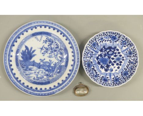 Two Chinese blue and white plates and an Arabic or Chinese quartz seal