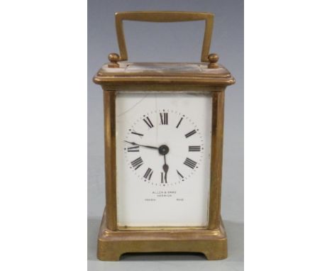 Late 19th/early 20thC French brass carriage clock by Allen and Daws, Norwich, the white enamel Roman dial with spade hands, 1