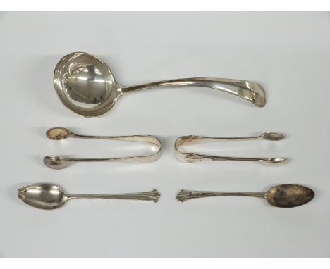 A quantity of hallmarked silver cutlery to include rat tail ladle, two pairs of sugar tongs and two teaspoons, Sheffield 1916