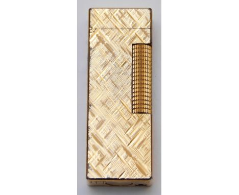 Dunhill plated cigarette lighter with chequered decoration, 6.5cm.&nbsp;