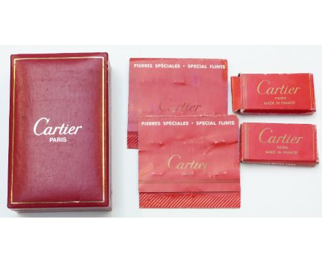 Cartier gold plated cigarette lighter with ribbed decoration, in original Cartier fitted box with two gas refill tanks and fl